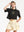 Camiseta Oversize Al ritmo de Medallo negro Mujer